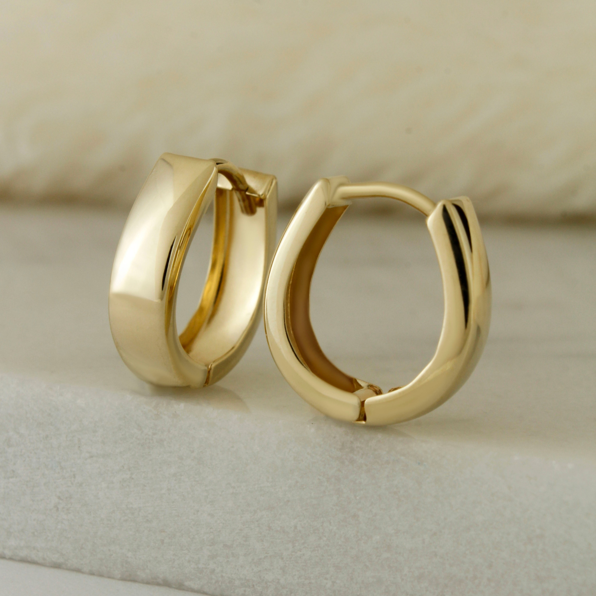 10k Solid Gold Oval Huggie Hoop Earrings - Serena Sparkles