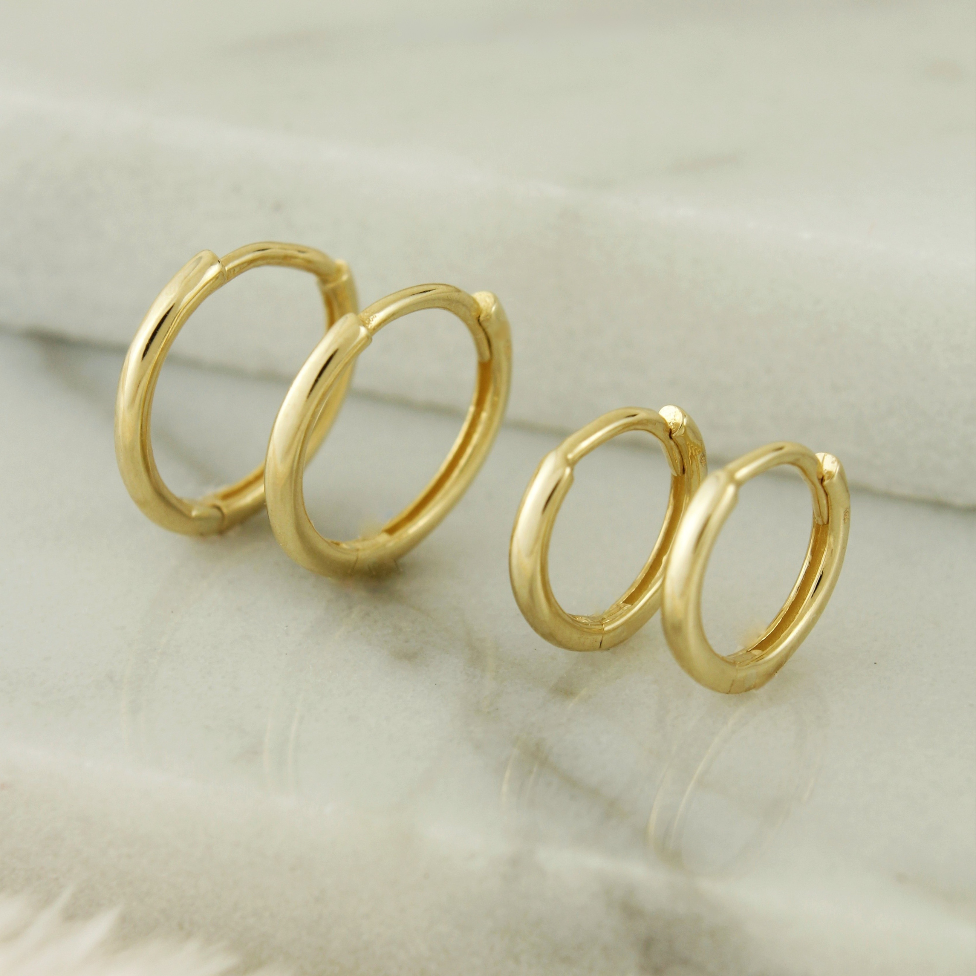 10k Solid Gold Tiny Huggie Hoop Earrings - Serena Sparkles