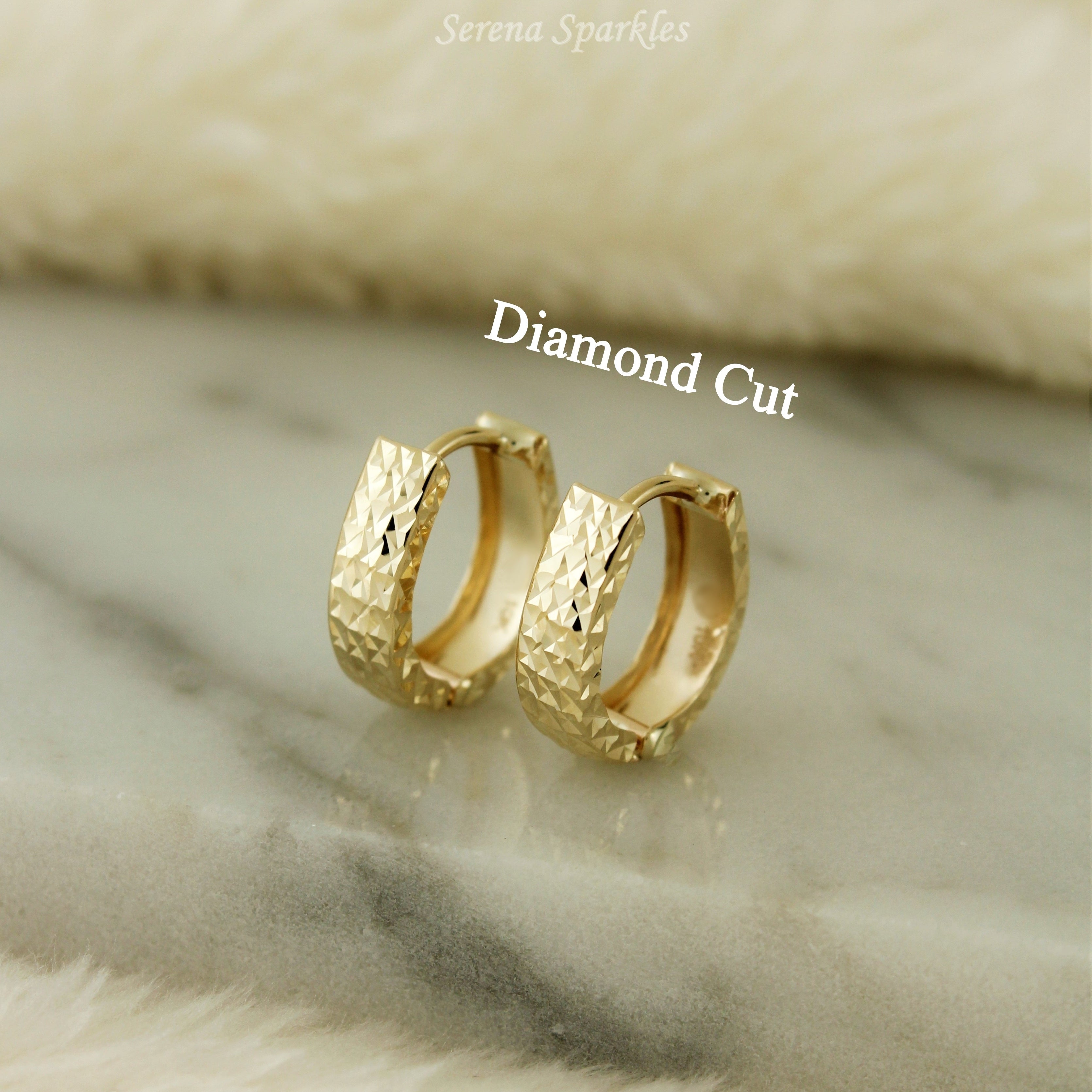 10k Solid Gold Diamond Cut Textured Oval Huggie Hoop Earrings - Serena Sparkles