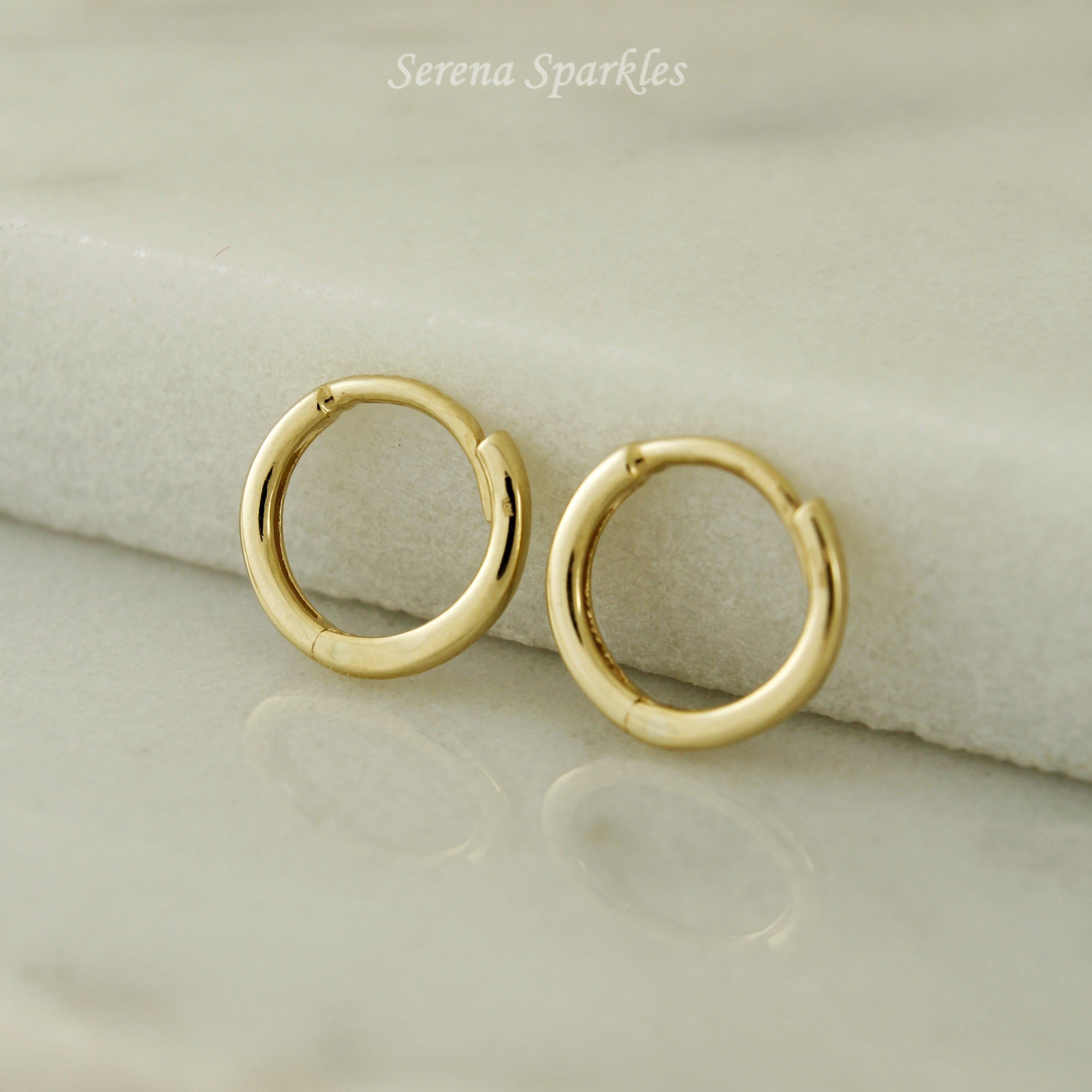 10k Solid Gold Tiny Huggie Hoop Earrings - Serena Sparkles