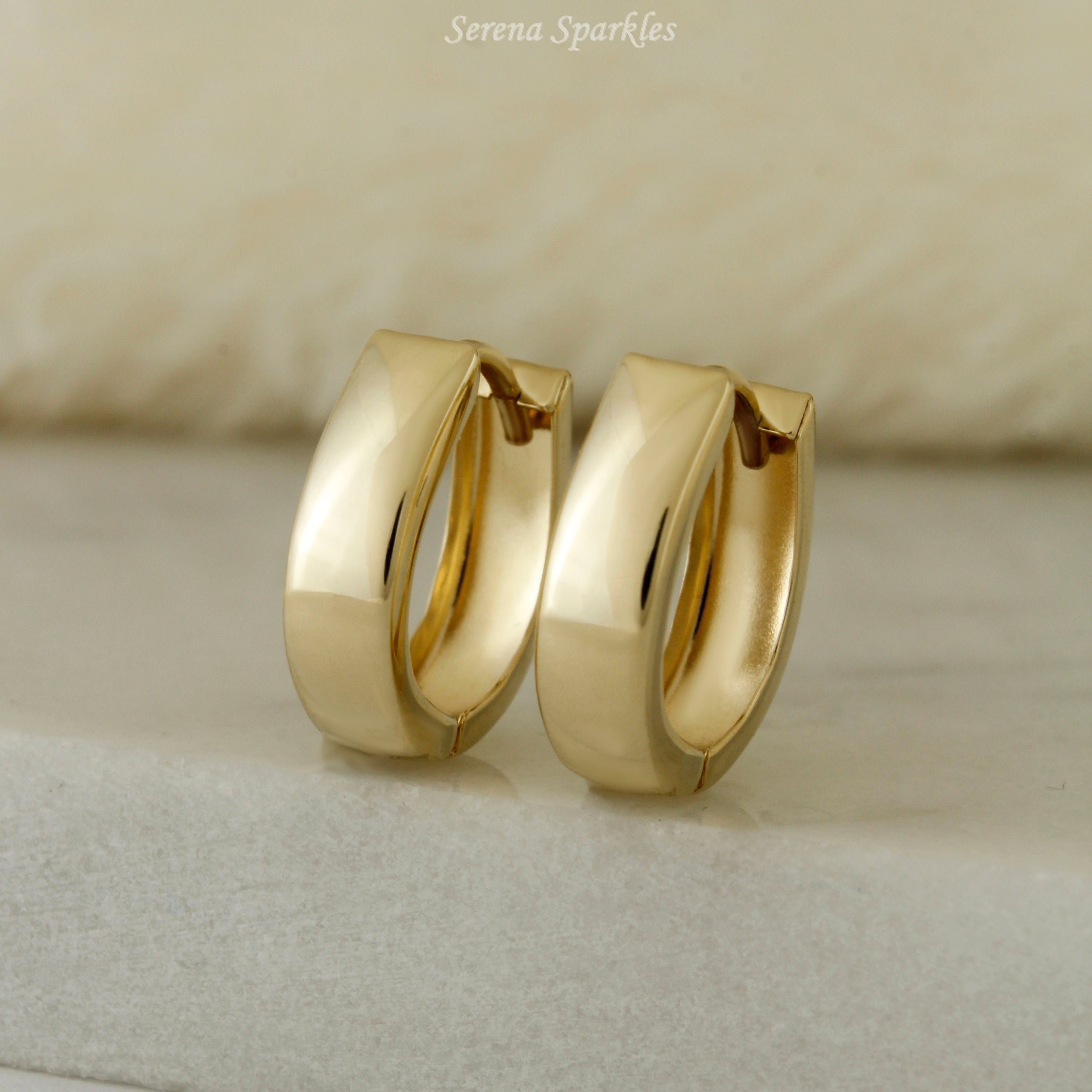 10k Solid Gold Oval Huggie Hoop Earrings - Serena Sparkles